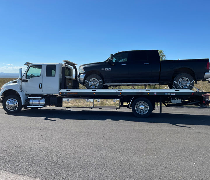 Towing-Service-Flatbed-Towing-Black-Truck-Alpine-Texas-Alpine-Towing Flatbed Towing Service Towing Black Truck Alpine Towing LLC Alpine Texas